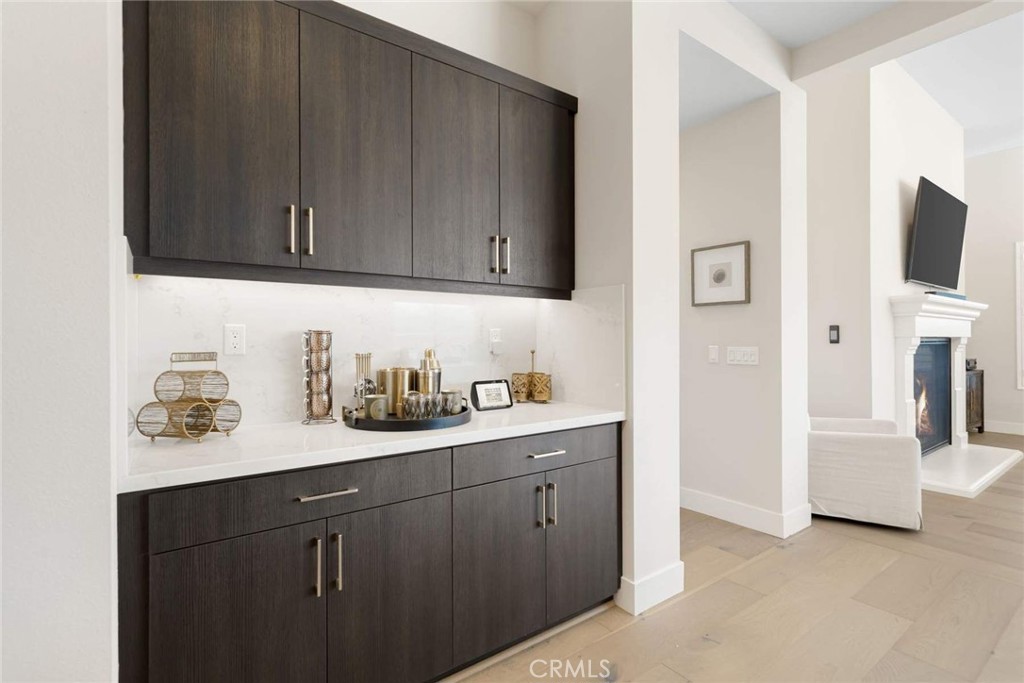 80467 Old Ranch Trail South La Quinta, CA 92253 - Photo 16 of 55 a kitchen with cabinets and sink