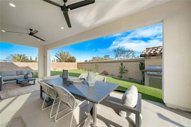 a view of a patio with swimming pool