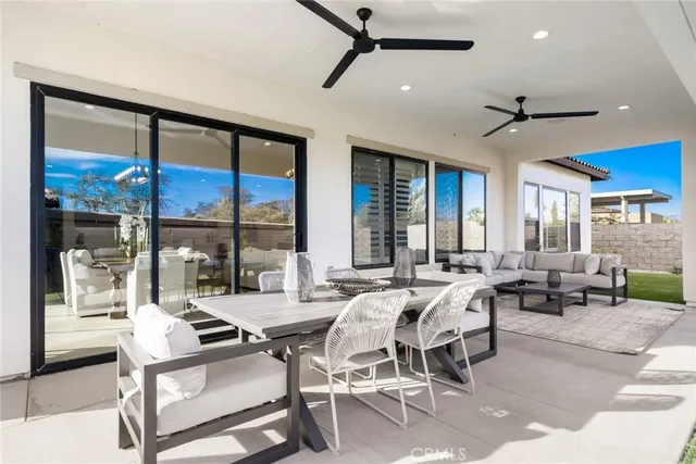 a backyard of a house with seating space