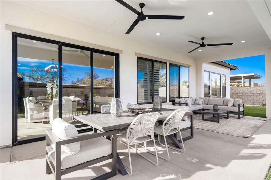 80467 Old Ranch Trail South La Quinta, CA 92253 - Photo 25 of 55 a very nice looking living room with furniture and a large window