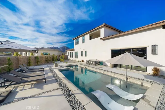 a view of a terrace with chairs