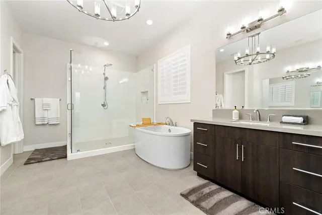 a bedroom with a bed next to a window with outer view