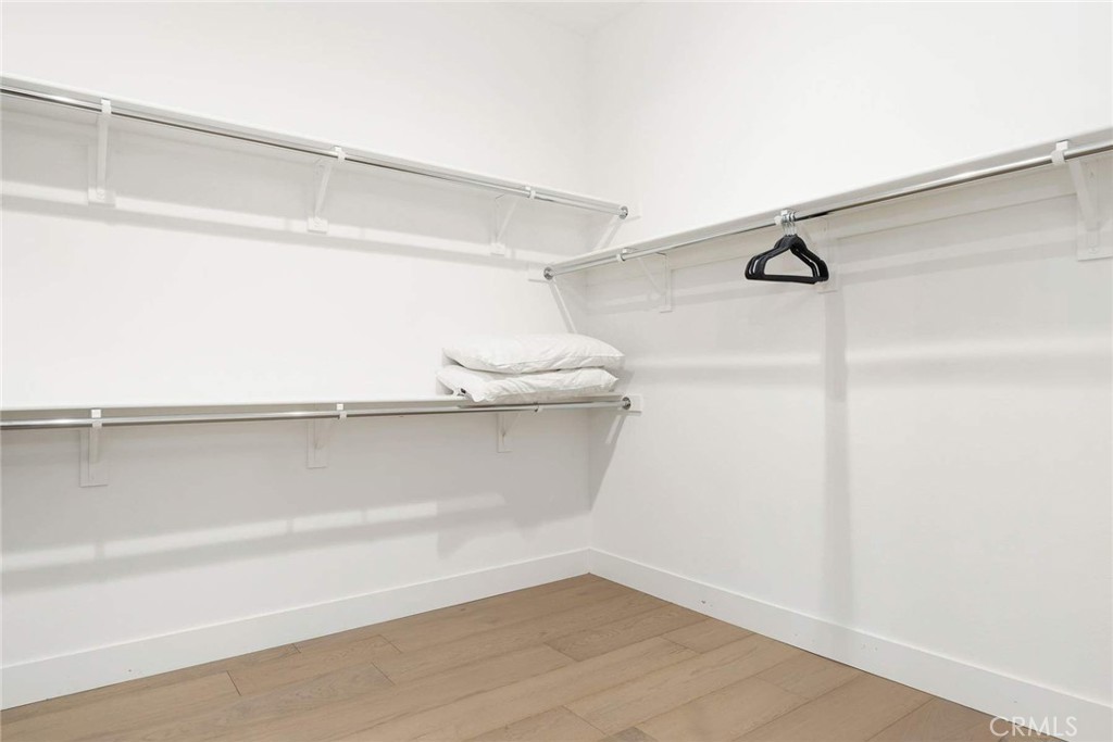 80467 Old Ranch Trail South La Quinta, CA 92253 - Photo 39 of 55 a view of small space with racks on the wall