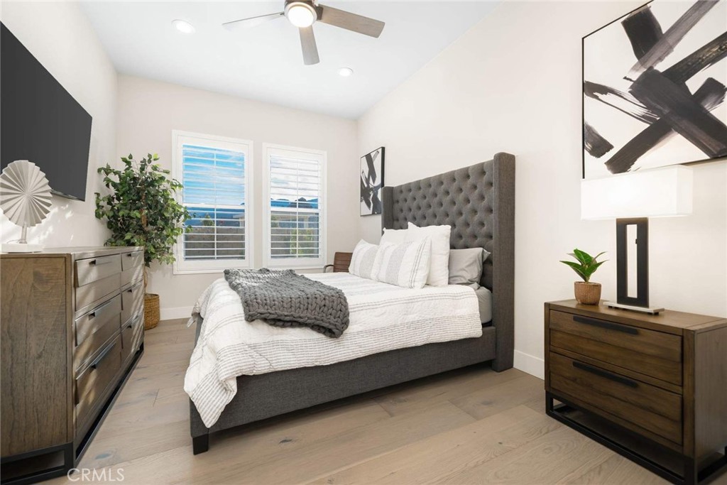 80467 Old Ranch Trail South La Quinta, CA 92253 - Photo 40 of 55 a bedroom with a bed next to a window with outer view