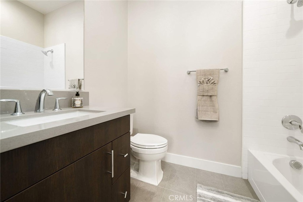 80467 Old Ranch Trail South La Quinta, CA 92253 - Photo 41 of 55 a bathroom with a sink toilet and a bathtub