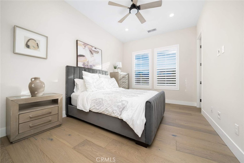 80467 Old Ranch Trail South La Quinta, CA 92253 - Photo 43 of 55 a spacious bedroom with a bed and a window
