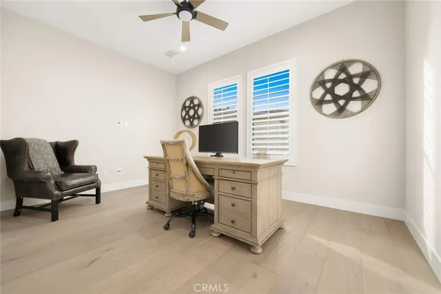 a room with furniture and wooden floor
