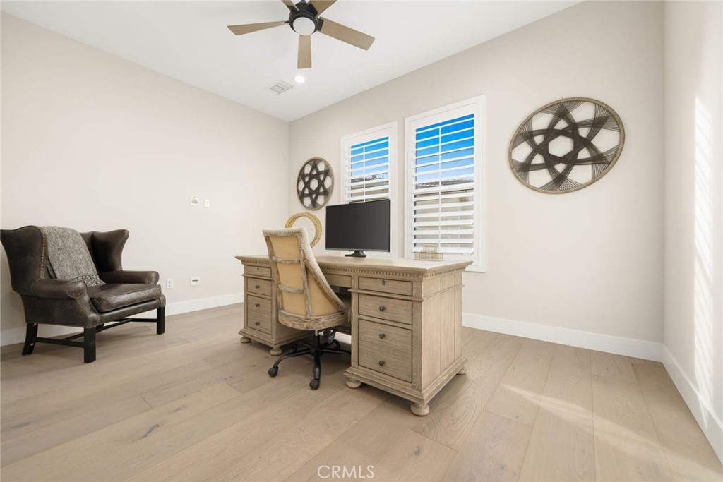 80467 Old Ranch Trail South La Quinta, CA 92253 - Photo 44 of 55 a view of a workspace with furniture and a window