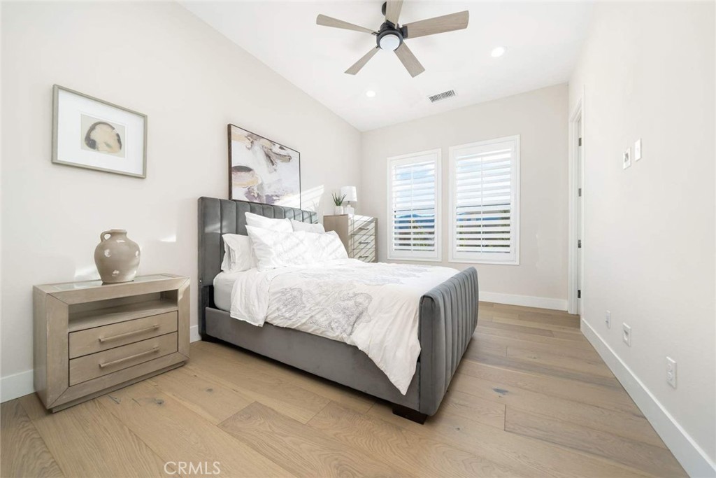 80467 Old Ranch Trail South La Quinta, CA 92253 - Photo 45 of 55 a spacious bedroom with a bed and a window