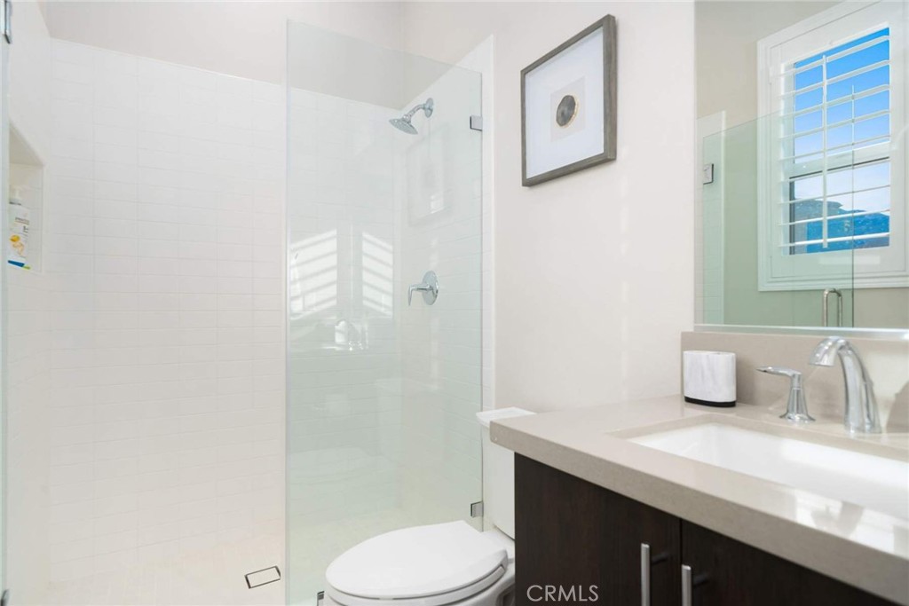 80467 Old Ranch Trail South La Quinta, CA 92253 - Photo 46 of 55 a bathroom with a sink toilet and shower