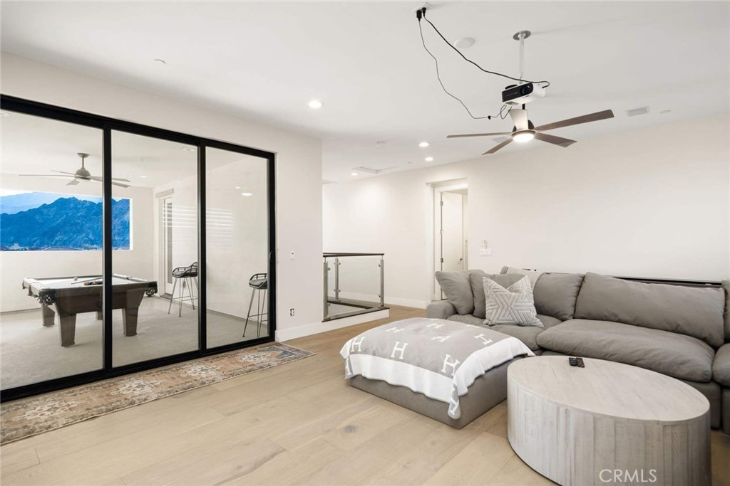 80467 Old Ranch Trail South La Quinta, CA 92253 - Photo 52 of 55 a living room with furniture and a large window