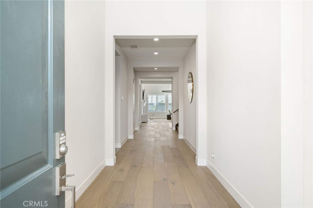 80467 Old Ranch Trail South La Quinta, CA 92253 - Photo 9 of 55 a view of a hallway with wooden floor