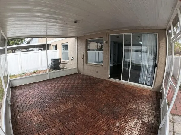 an empty room with entrance door