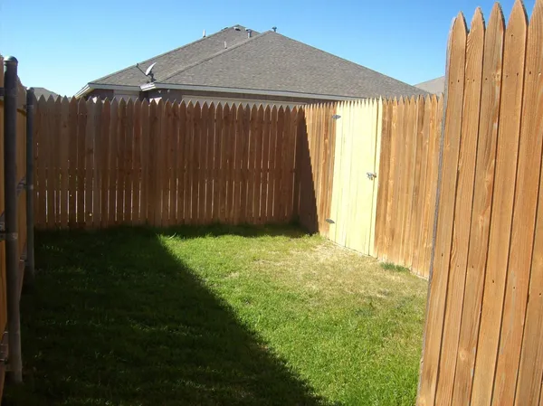 a view of a backyard with a garden