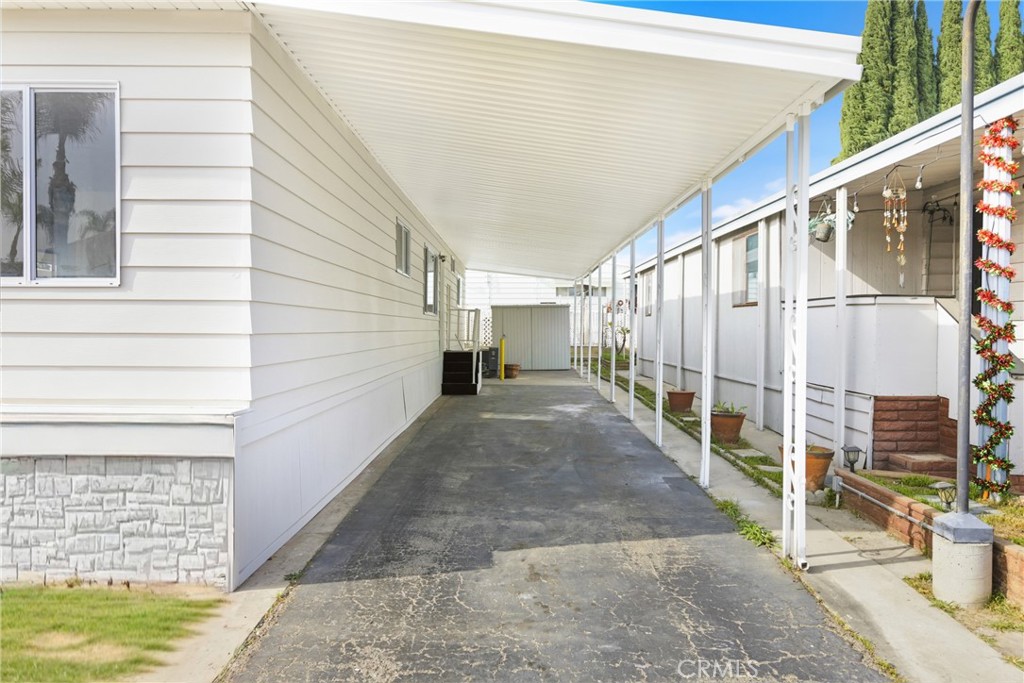300 North Rampart Street, Unit 152 Orange, CA 92868 - Photo 28 of 29 a view of a pathway of a house