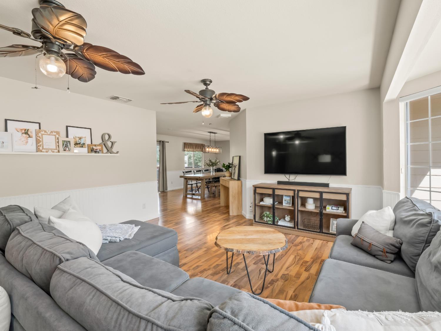 31173 Moccassin Way Coarsegold, CA 93614 - Photo 11 of 48 a living room with furniture and a flat screen tv