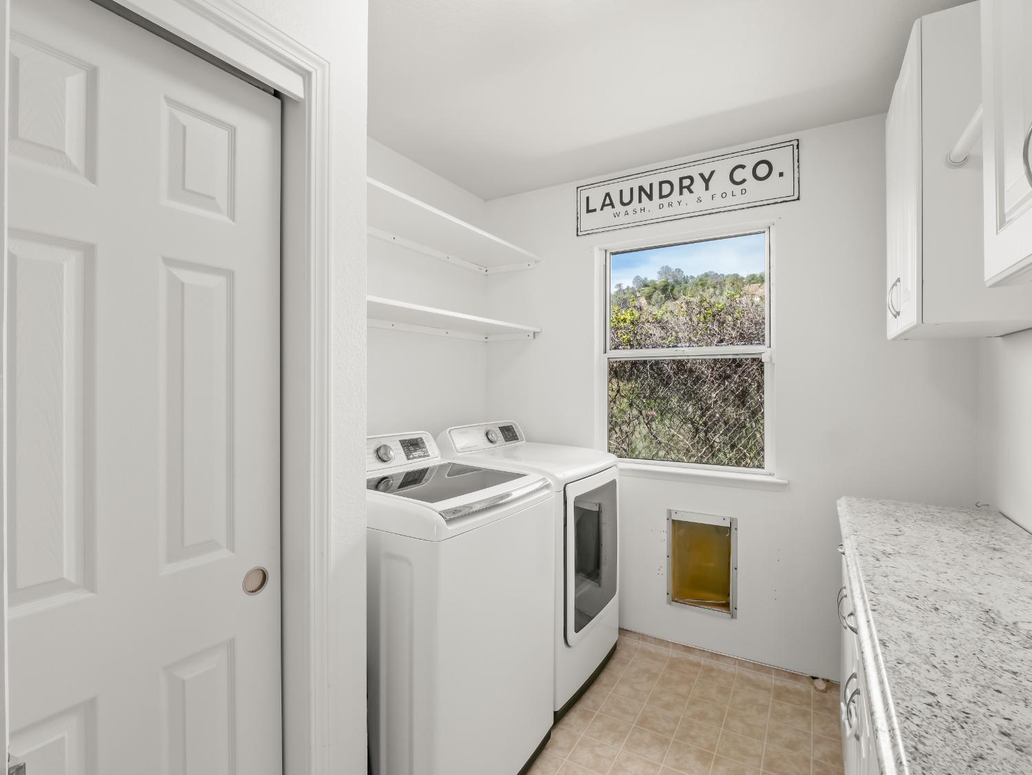 31173 Moccassin Way Coarsegold, CA 93614 - Photo 20 of 48 a utility room with dryer and washer