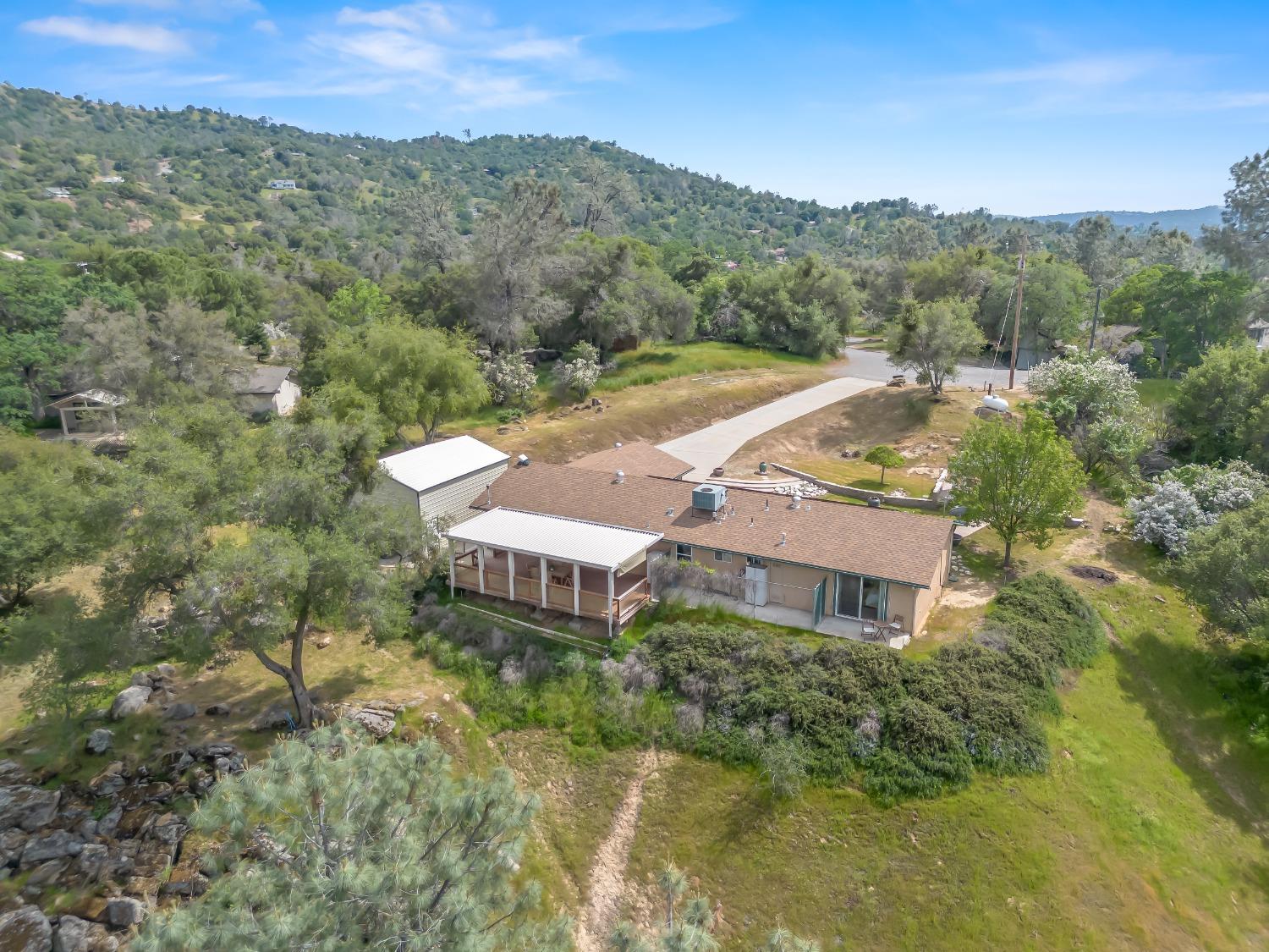 31173 Moccassin Way Coarsegold, CA 93614 - Photo 40 of 48 an aerial view of a house