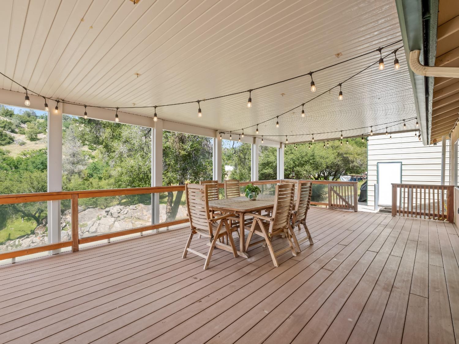 31173 Moccassin Way Coarsegold, CA 93614 - Photo 42 of 48 a dining space with wooden floor and outdoor space