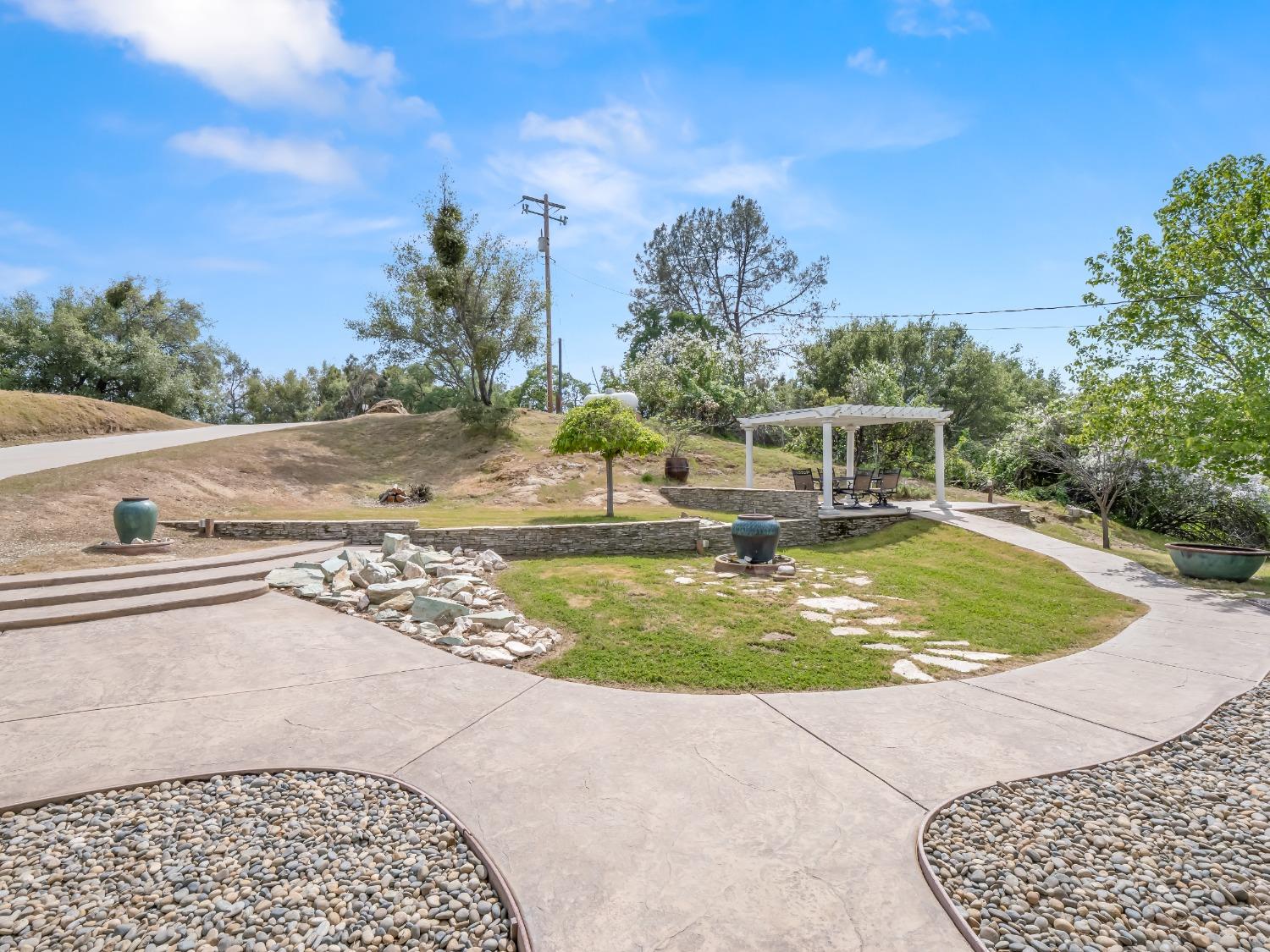 31173 Moccassin Way Coarsegold, CA 93614 - Photo 5 of 48 a view of a swimming pool with a yard