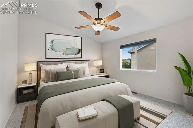 a bedroom with a bed and window