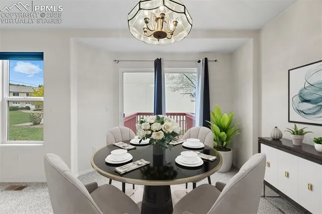 a view of a balcony with furniture