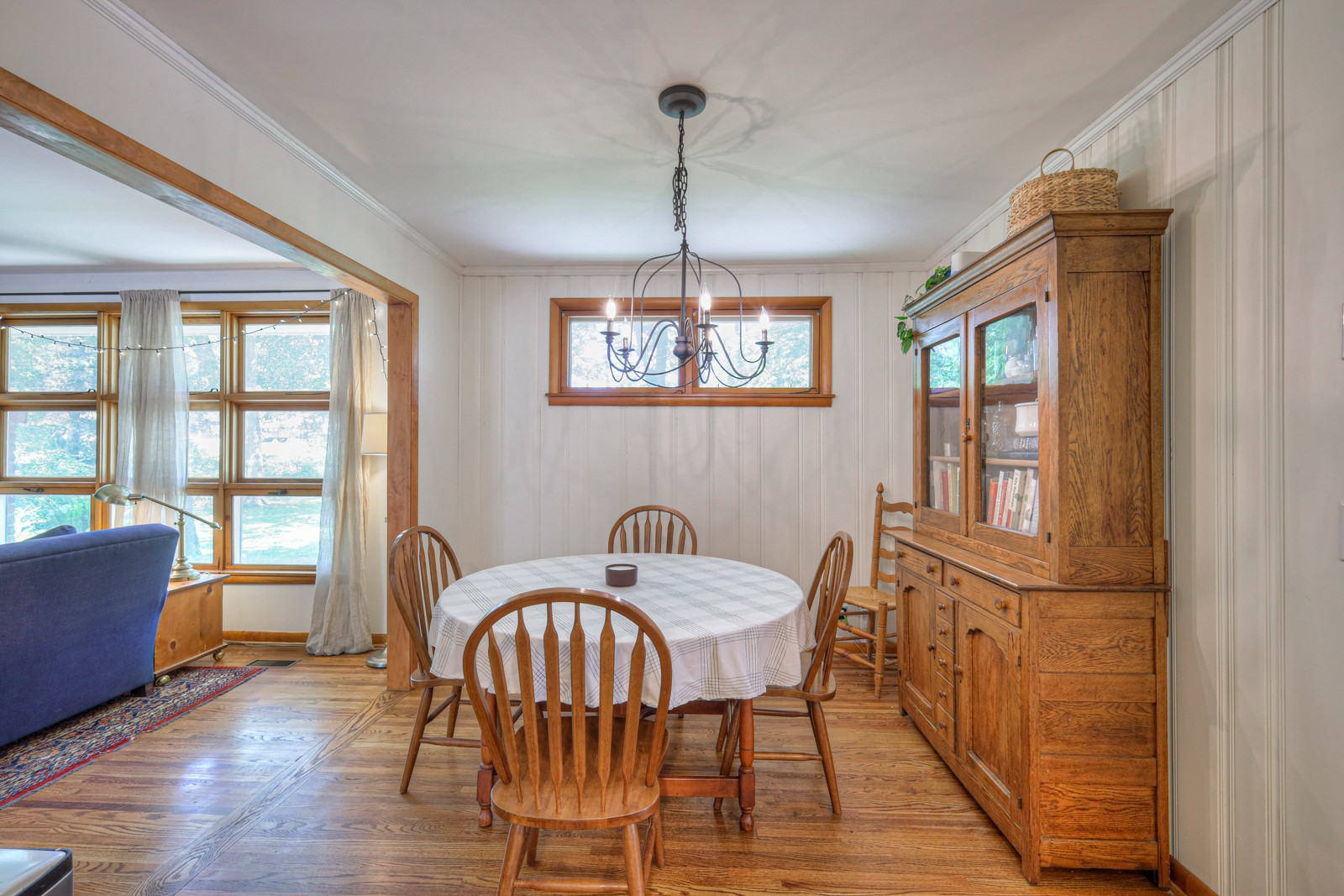 1016 Neelys Bend Road Madison, TN 37115 - Photo 5 of 27 a dining room with furniture a chandelier and wooden floor