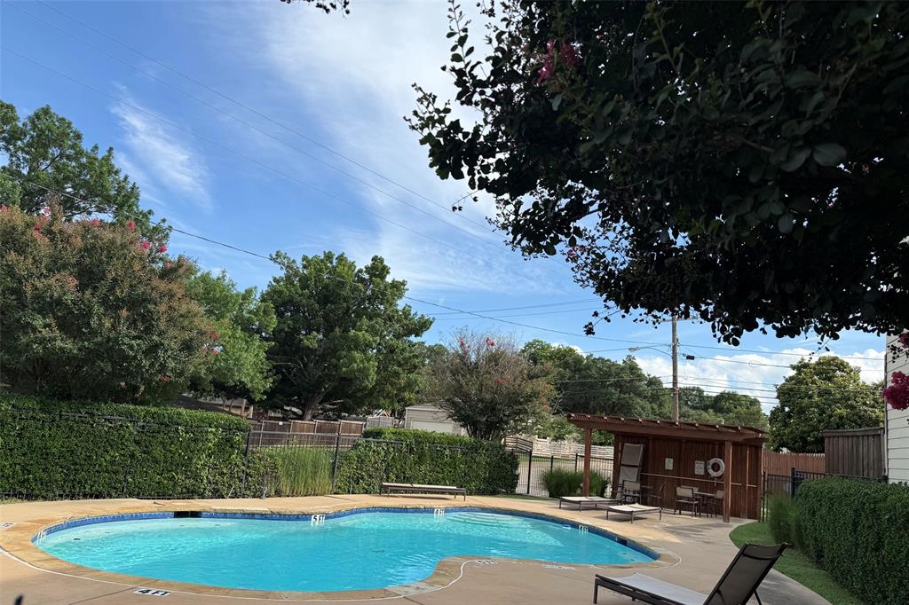 9495 Timberleaf Drive Dallas, TX 75243 - Photo 11 of 11 Community pool on other side of street at corner