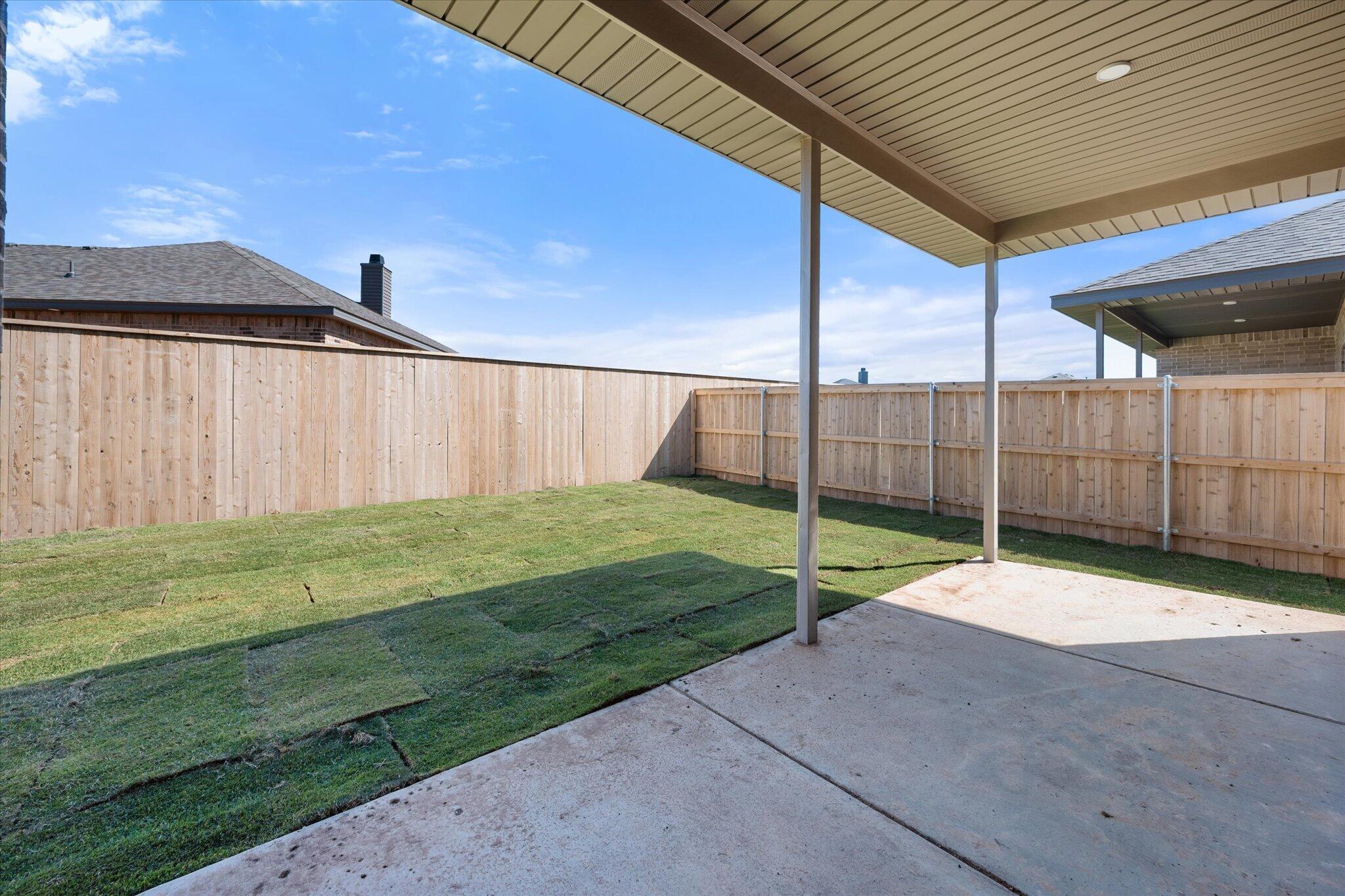 7003 53rd Street Lubbock, TX 79407 - Photo 25 of 25 a backyard of a house