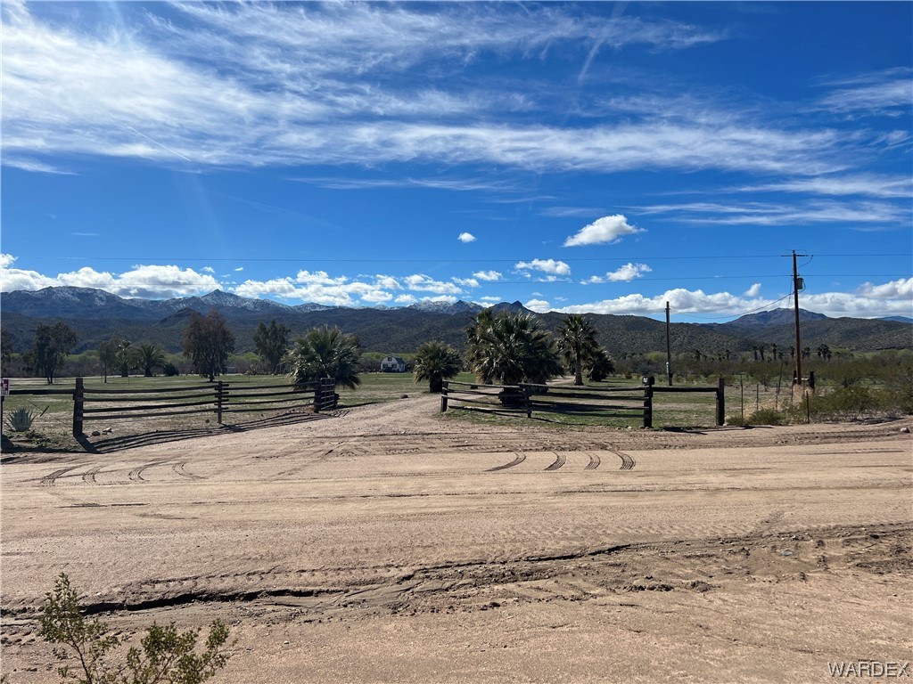 19167 Cholla Canyon Ranch Road Wikieup, AZ 85360 - Photo 11 of 97 a view of a backyard of a house