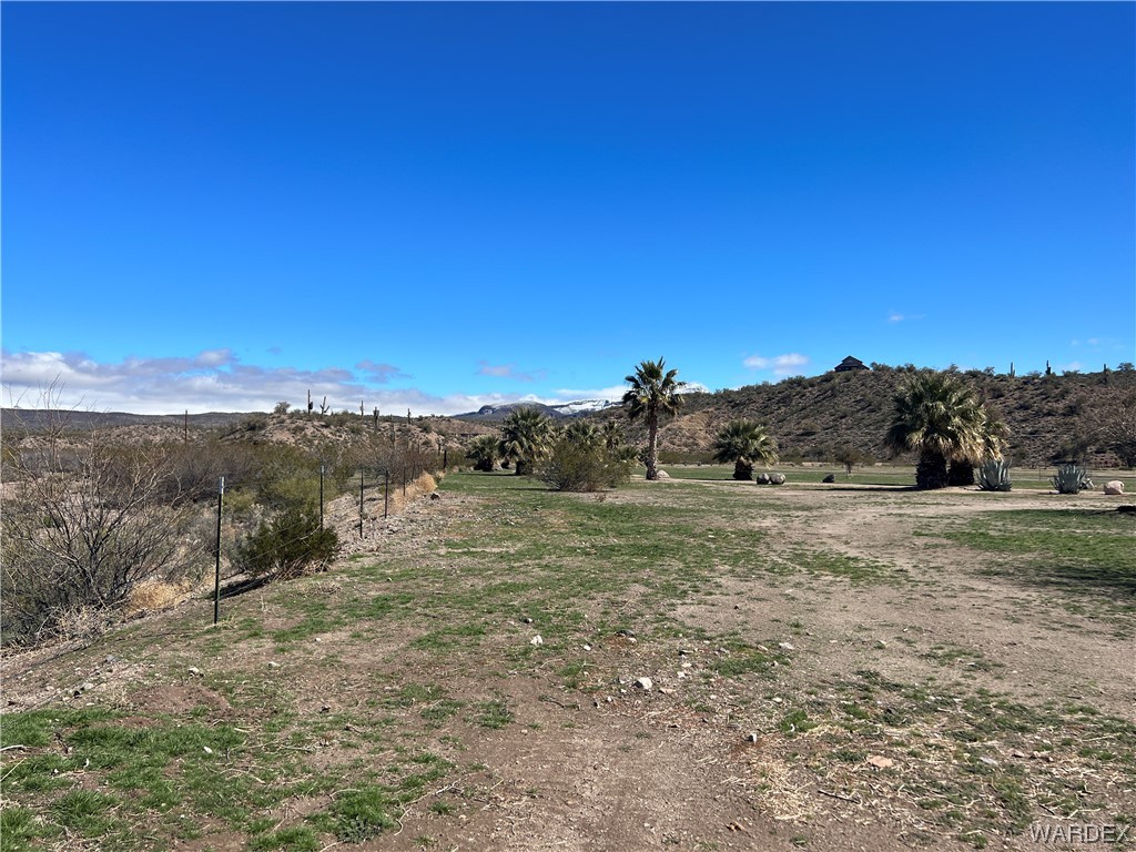 19167 Cholla Canyon Ranch Road Wikieup, AZ 85360 - Photo 20 of 97 a view of an outdoor space with mountain view