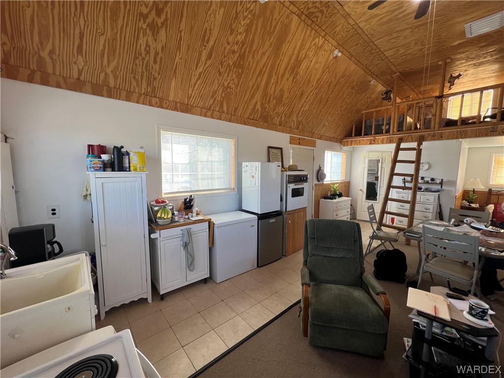 19167 Cholla Canyon Ranch Road Wikieup, AZ 85360 - Photo 24 of 97 a room with storage and utility