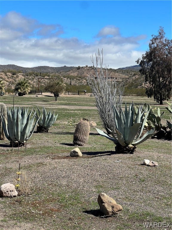 19167 Cholla Canyon Ranch Road Wikieup, AZ 85360 - Photo 42 of 97 a view of a lake with a outdoor space
