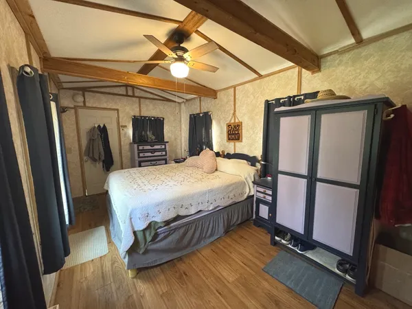 a view of a kitchen with furniture and a kitchen view