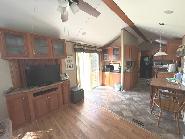 a view of a lake with furniture