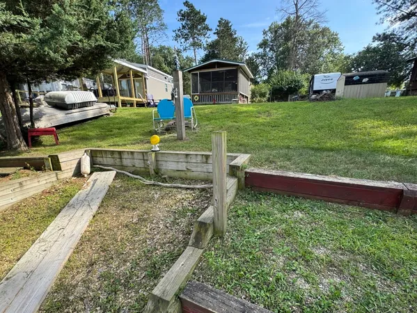 a view of a backyard with a garden