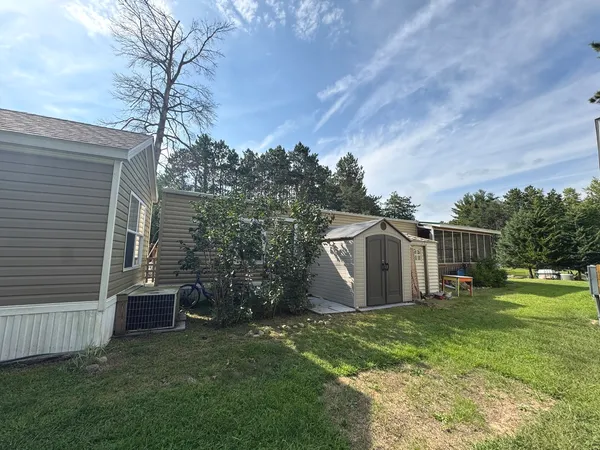 a view of a back yard of the house