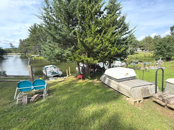 a view of a balcony with furniture