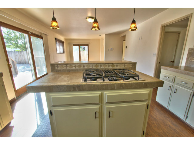 22675 Coleta Drive Salinas, CA 93908 - Photo 11 of 23 a kitchen with a stove and a window
