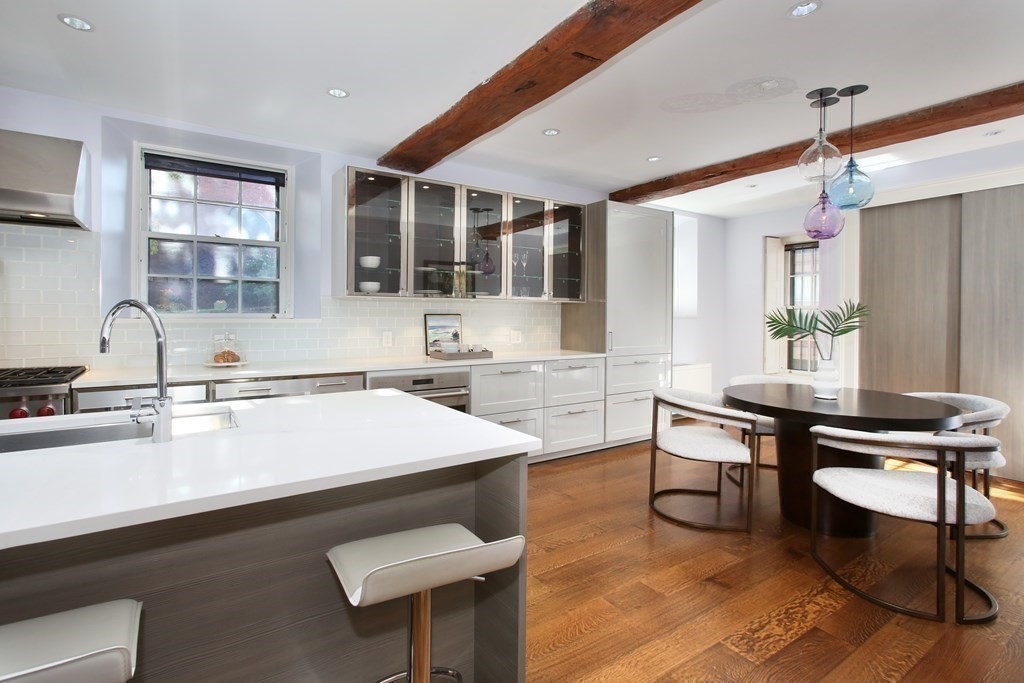 14 Walnut Street Boston, MA 02108 - Photo 15 of 42 a kitchen with a sink cabinets and wooden floor