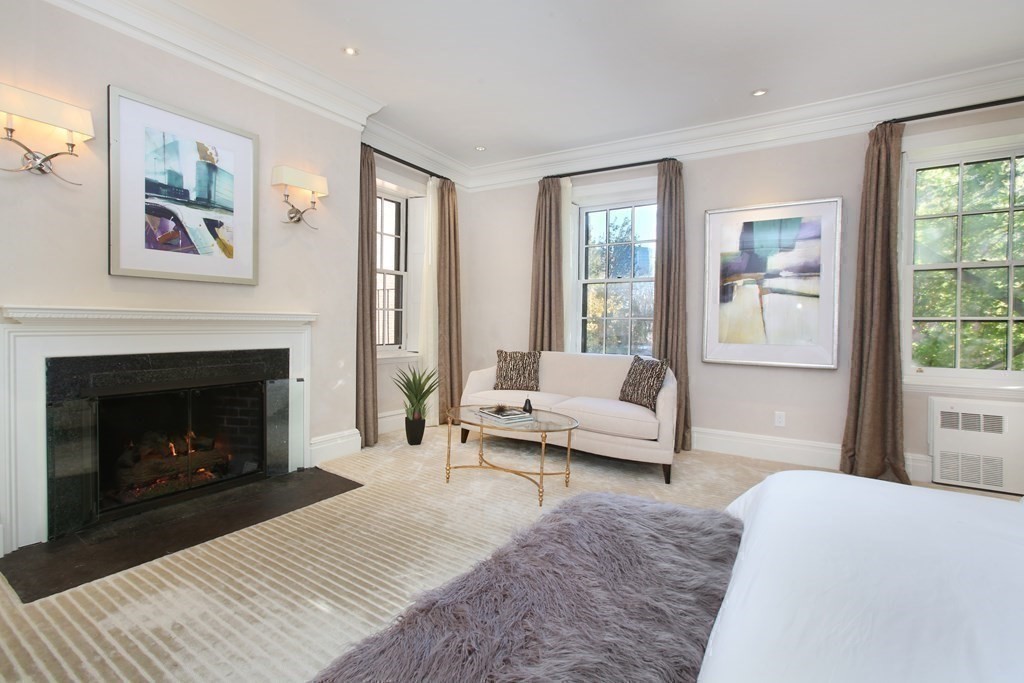14 Walnut Street Boston, MA 02108 - Photo 25 of 42 a living room with furniture and a fireplace