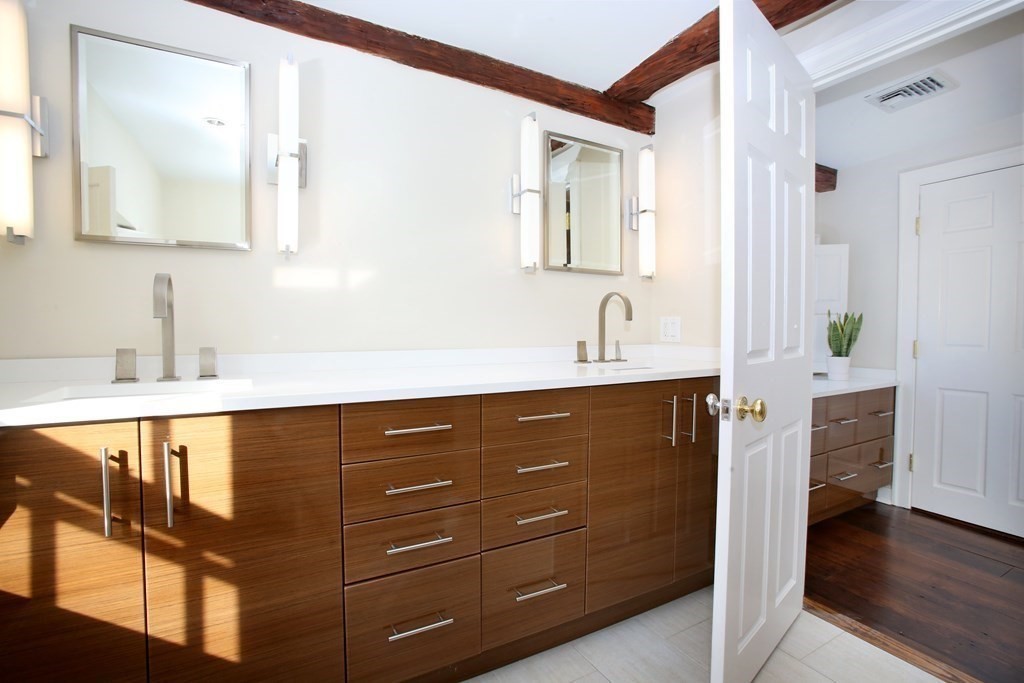 14 Walnut Street Boston, MA 02108 - Photo 33 of 42 a bathroom with a sink and a mirror