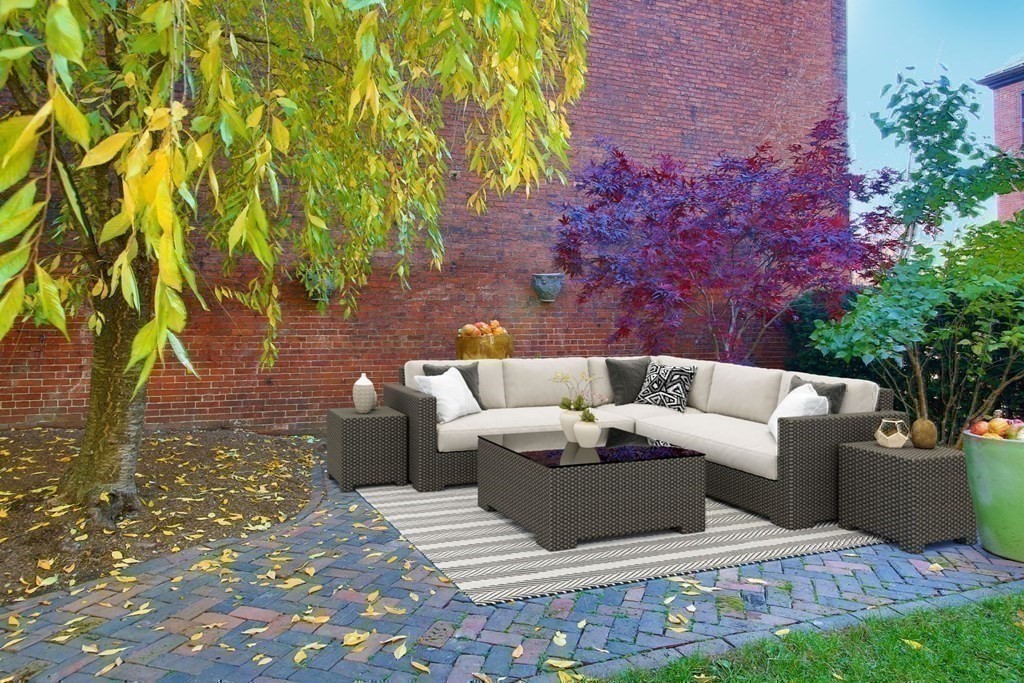 14 Walnut Street Boston, MA 02108 - Photo 36 of 42 a couple of couches sitting in a backyard with plants