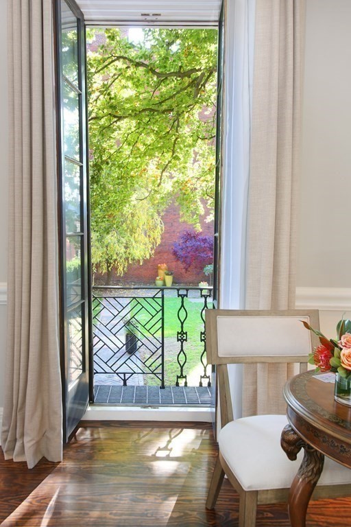 14 Walnut Street Boston, MA 02108 - Photo 7 of 42 a view of a room with a large window