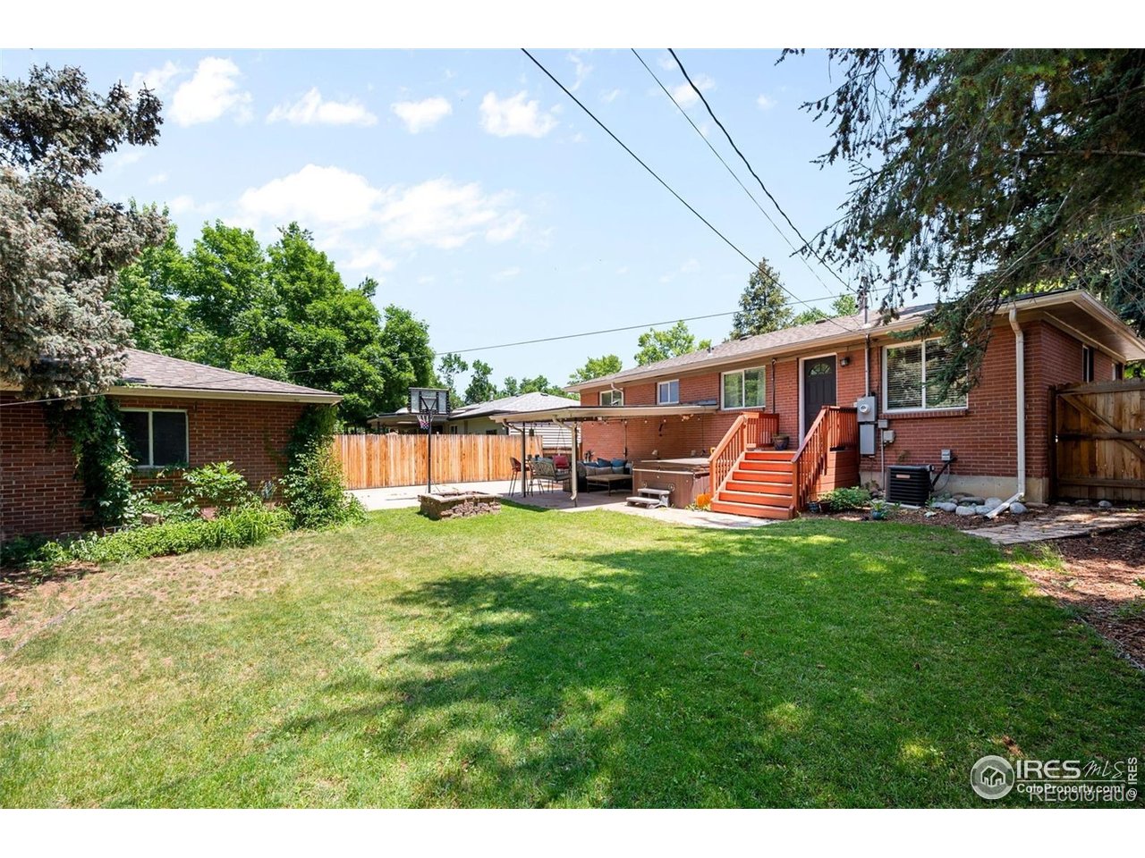 4175 South Inca Street Englewood, CO 80110 - Photo 24 of 29 a view of a house with backyard and porch