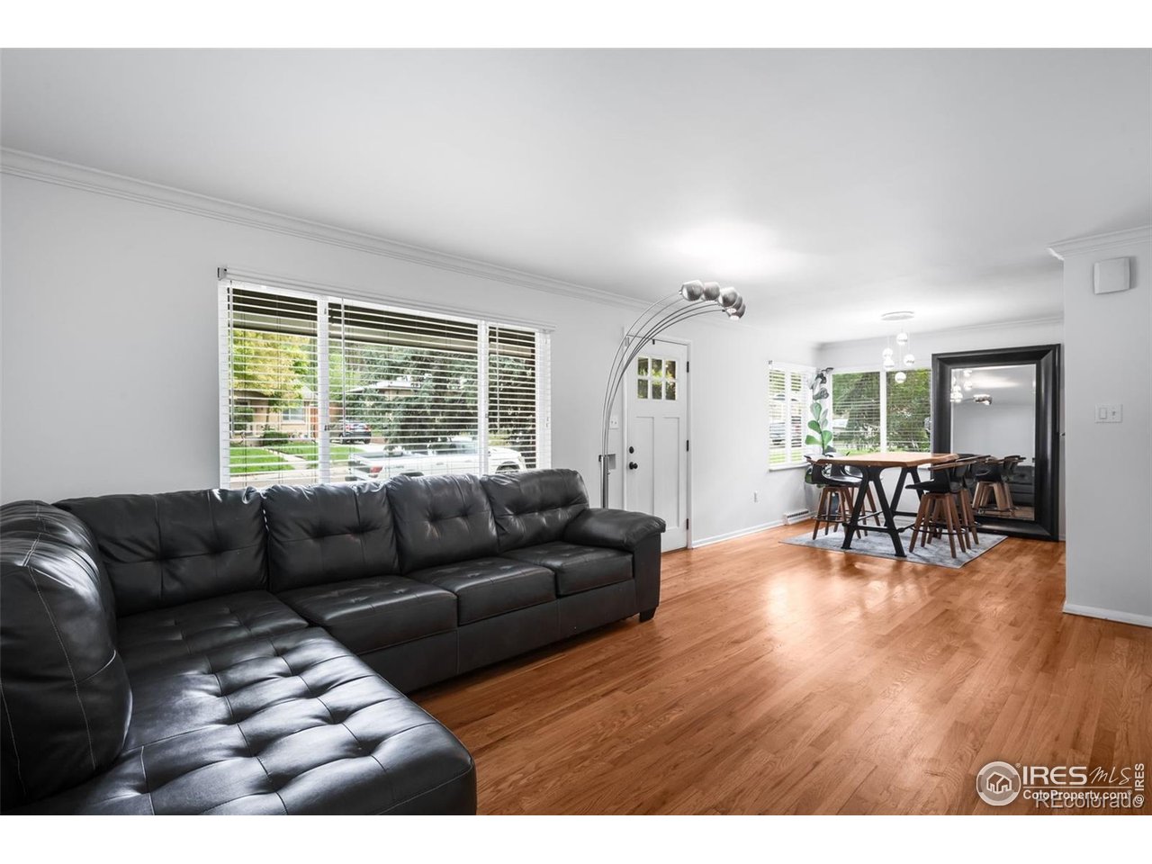4175 South Inca Street Englewood, CO 80110 - Photo 5 of 29 a living room with furniture and a large window