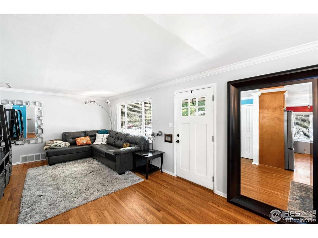 4175 South Inca Street Englewood, CO 80110 - Photo 6 of 29 a living room with furniture and a window