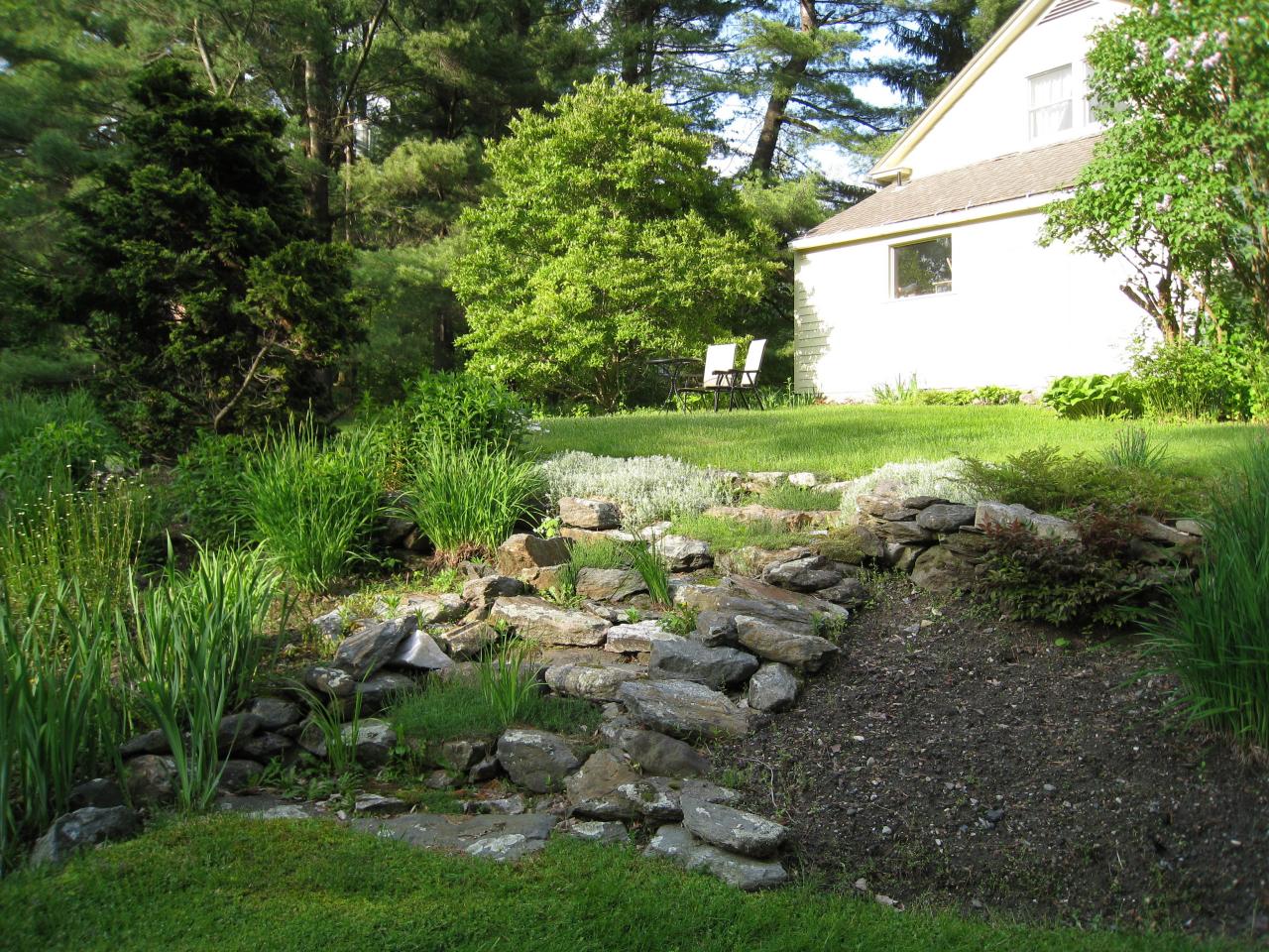 10 Glendale Road Stockbridge, MA 01229 - Photo 14 of 16 a view of a house with a yard and sitting area