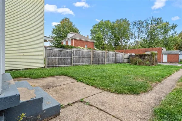 a view of a backyard with a garden