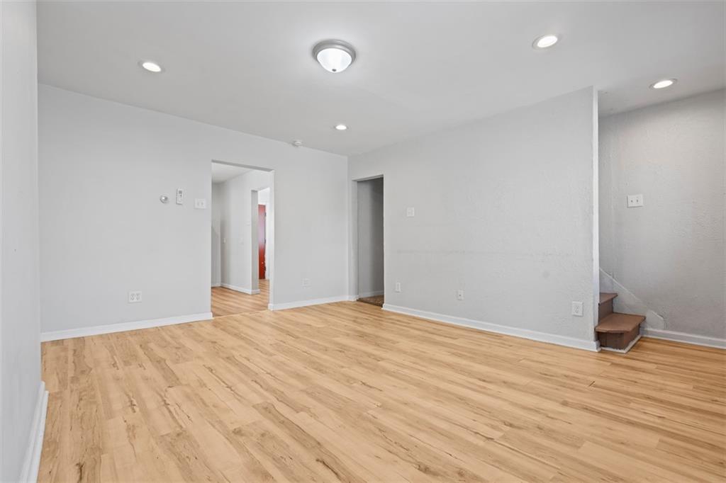519 3rd Avenue Carnegie, PA 15106 - Photo 8 of 37 a view of an empty room with wooden floor